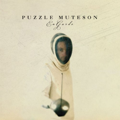 Album cover for Puzzle Muteson’s “En Garde” featuring a fencer.