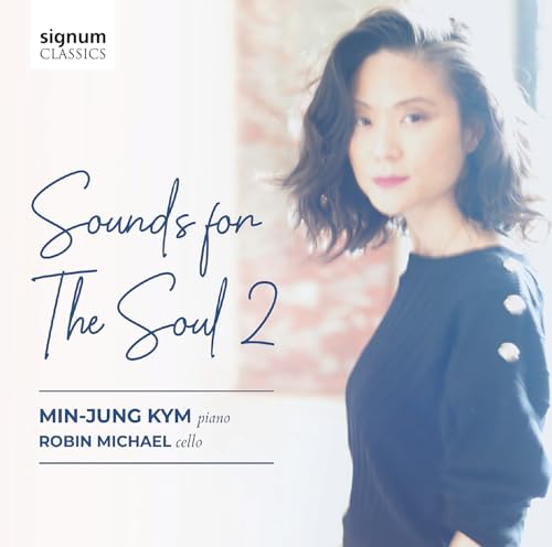 CD cover featuring a portrait of a woman and calligraphy text.