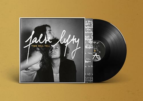 Black vinyl record and album cover with a couple in grayscale.
