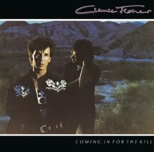 Album cover for Climie Fisher’s “Coming In For The Kill” featuring two figures.