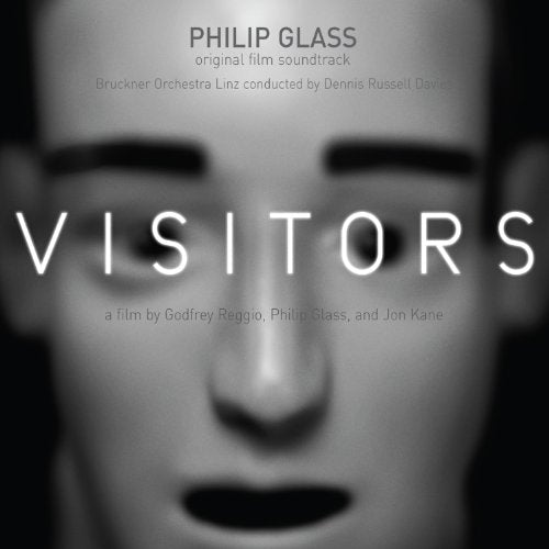 CD cover for Philip Glass’s “Visitors” featuring a blurred face.