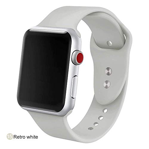 Silver Apple Watch with a white sport band, screen is black.