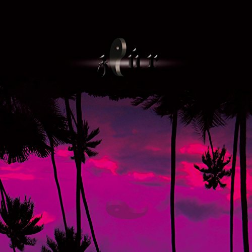 Silhouetted palm trees against a vibrant pink and purple sunset sky.