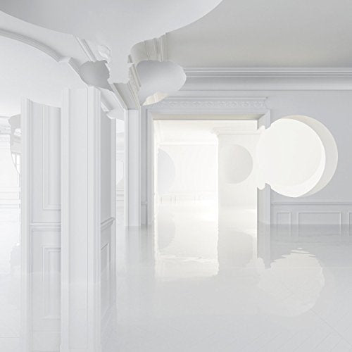 White abstract architectural interior with circular openings and reflective floor.