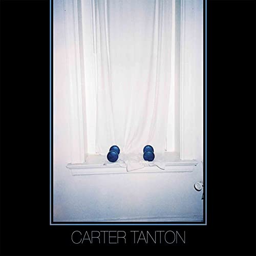 Vinyl album cover: white curtains, dark background, and blue dumbbells.