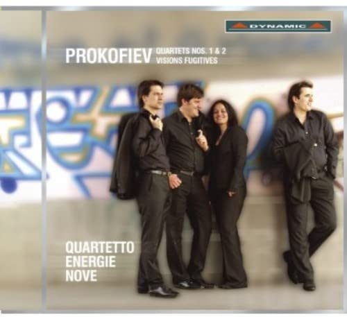 CD cover featuring three musicians in dark clothing against a graffiti wall.