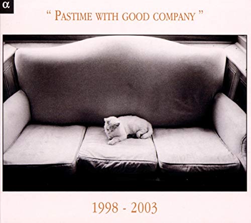 CD cover: a white cat sleeps on a vintage, cushioned sofa.