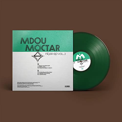 Green vinyl record with turquoise album cover displaying "Mdou Moctar".