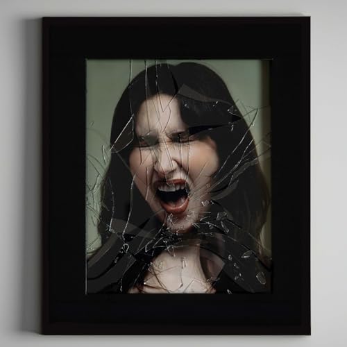 Black framed album cover with a distressed portrait of a screaming woman.