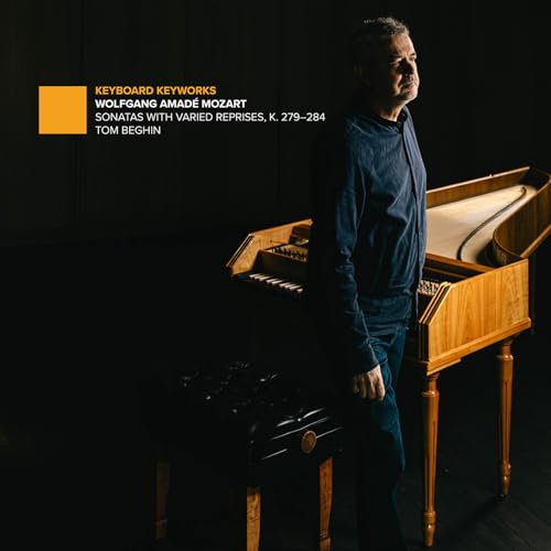 Tom Beghin beside a wooden fortepiano, CD cover for Mozart sonatas.