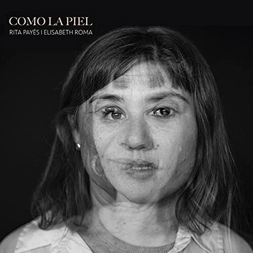 Black and white portrait of a woman, album cover "Como La Piel".
