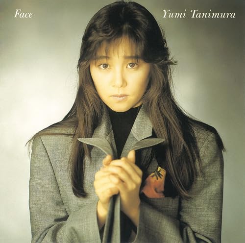 Yumi Tanimura album cover featuring a portrait of the singer.