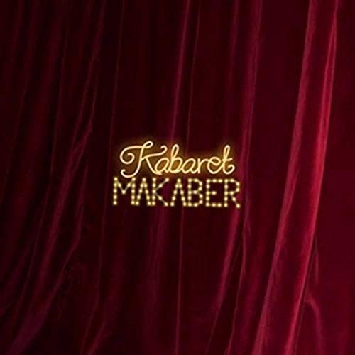 Red velvet curtain with golden text reading "Kabaret Makaber.