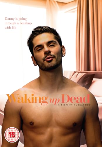 DVD cover for “Waking Up Dead” featuring a shirtless man with dark hair.