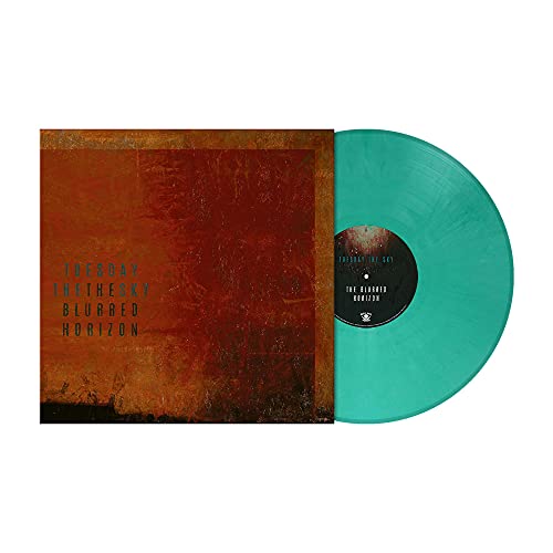 Turquoise marbled vinyl record with a textured, reddish-brown album cover.
