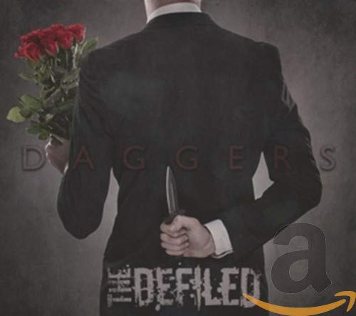 Man in suit holding roses and a hidden dagger.