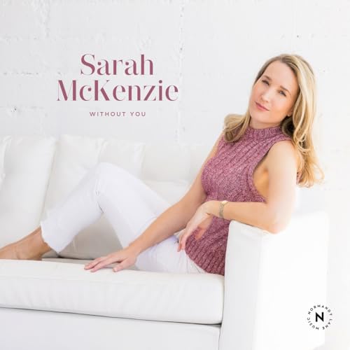 CD cover featuring Sarah Mckenzie sitting on a white couch.