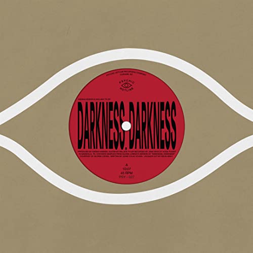 Red vinyl record label with white eye-shaped graphic and text.