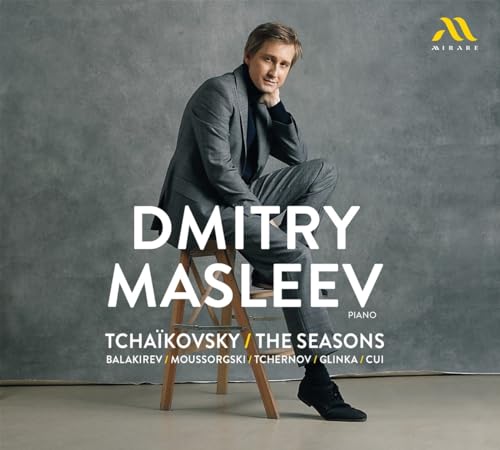 CD cover featuring pianist Dmitry Masleev in a grey suit.