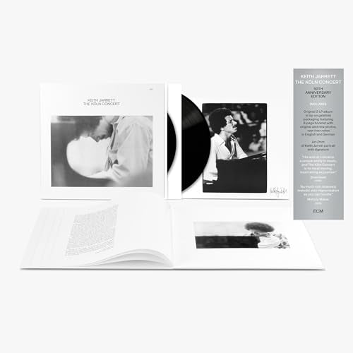 Keith Jarrett Koln Concert vinyl set with gatefold cover, black record, and open booklet.
