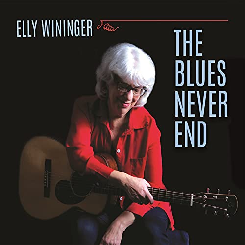 Elly Wininger with guitar, album cover for "The Blues Never End.