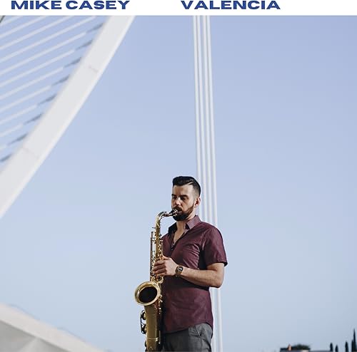 Saxophonist Mike Casey playing in front of the City of Arts and Sciences.