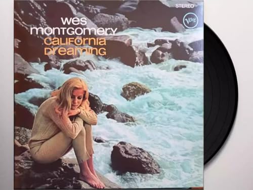 Wes Montgomery album cover with a woman by a river, vinyl record beside.