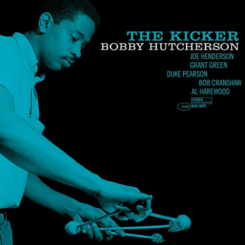 Bobby Hutcherson album cover, “The Kicker,” featuring a vibraphonist and cat’s cradle.