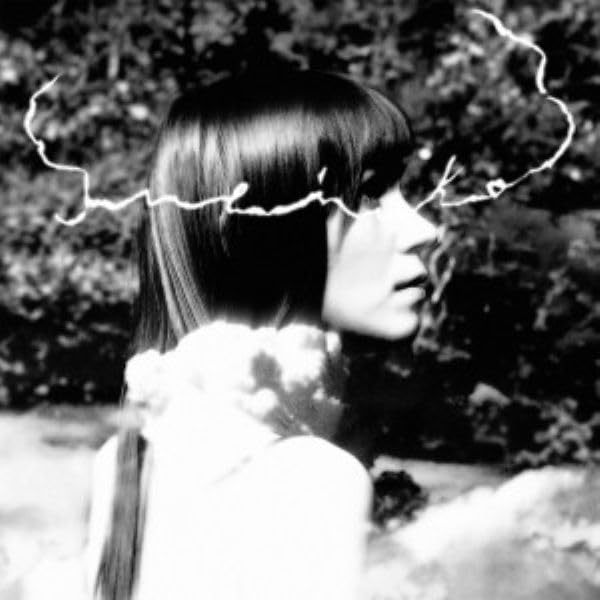 Black and white portrait of a woman with abstract white lines.