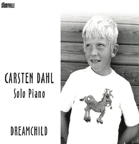 Black and white album cover featuring a young boy and text.