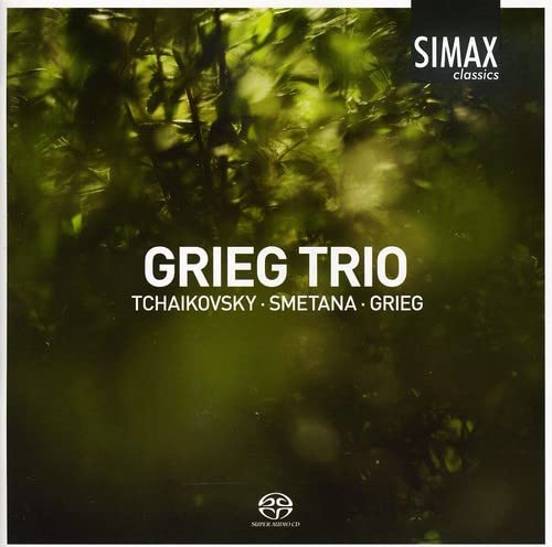 CD cover for Grieg Trio featuring green foliage and composer names.