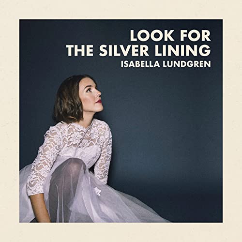 CD cover featuring Isabella Lundgren in a lace dress, looking upwards.