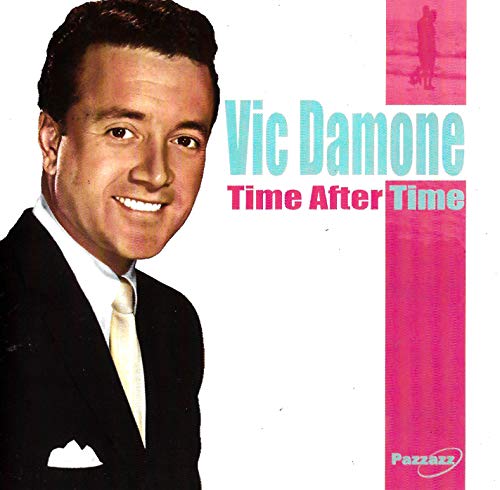 Vic Damone album cover, portrait of a smiling man in a suit.
