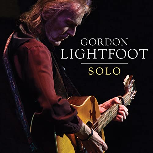 Gordon Lightfoot playing acoustic guitar, album cover for “Solo.”