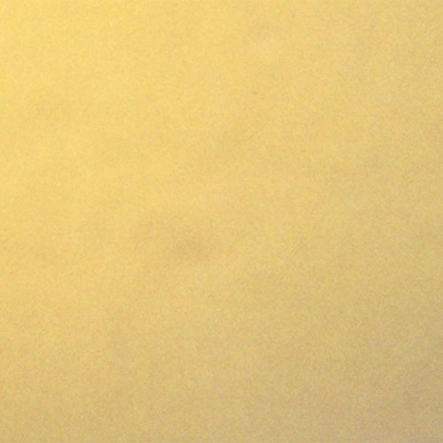 Solid yellow CD case with slight texture and a faint mark.