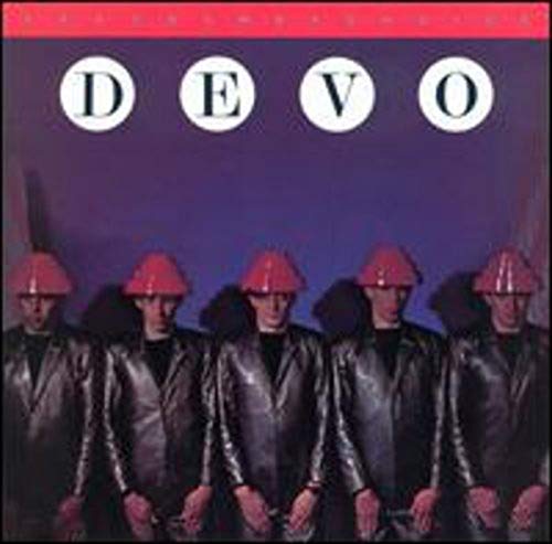 Five men in shiny jackets and red energy dome hats against a purple background.