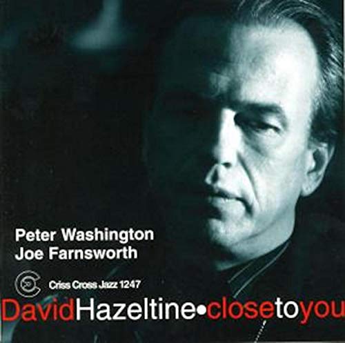 Close-up portrait of David Hazeltine on a dark blue CD cover.
