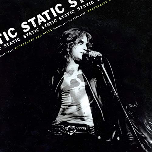Black and white album cover featuring a singer with a microphone.