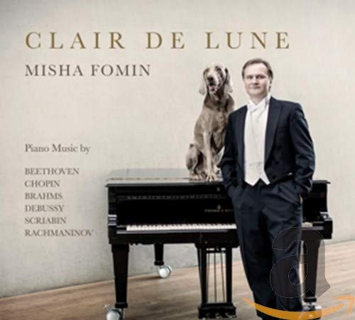 CD cover: pianist Misha Fomin with a dog by a grand piano.