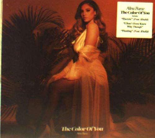 Alina Baraz CD cover featuring a woman in a flowing dress among palms.