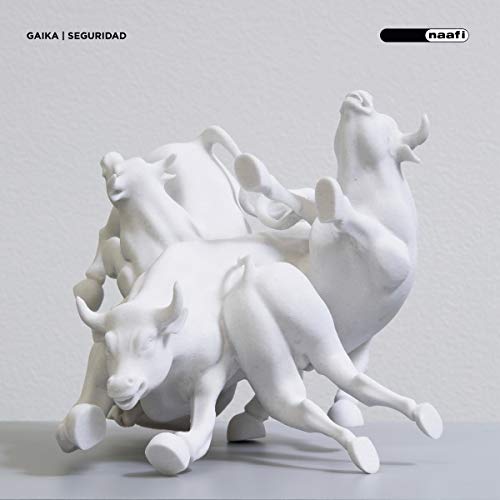 Vinyl album cover for GAIKA - SEGURIDAD featuring white bull sculptures.