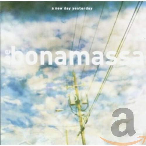Joe Bonamassa album cover, "A New Day Yesterday," with power lines.