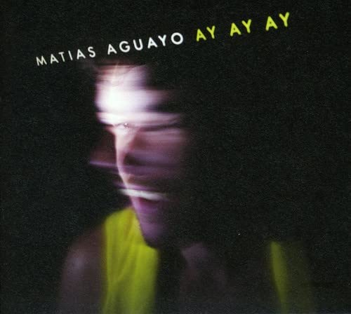 CD cover for Matias Aguayo’s “Ay Ay Ay” featuring a blurred face.