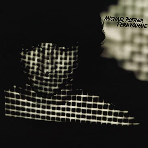 Michael Rother’s “Fernwärme” vinyl album cover: abstract face in grid pattern.