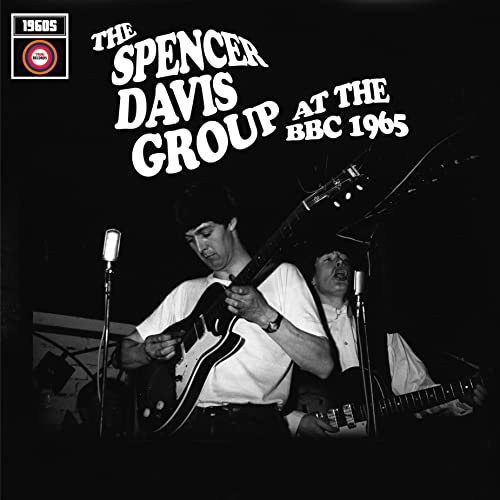 Black and white album cover featuring The Spencer Davis Group performing live.