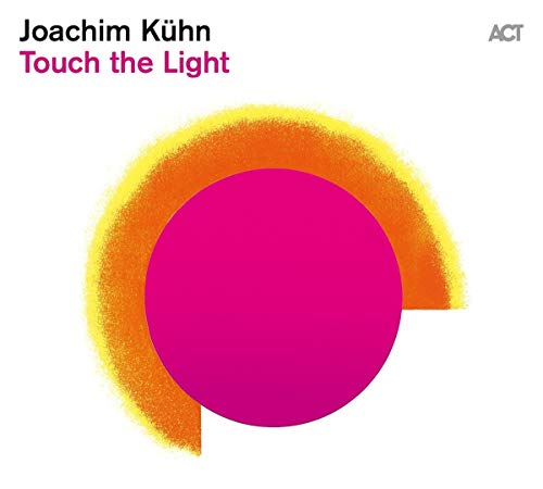 CD cover for Joachim Kühn’s “Touch The Light” with abstract orange and pink circles.