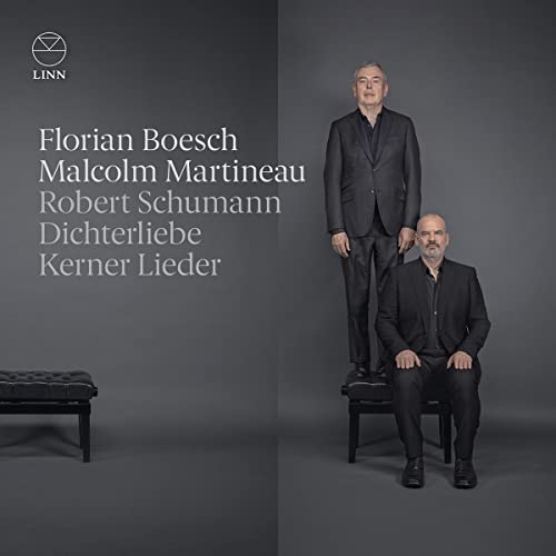 CD cover featuring two men in suits, text listing artists and song titles.