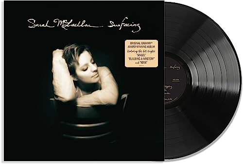 Sarah McLachlan's "Surfacing" vinyl record with album cover and black disc.