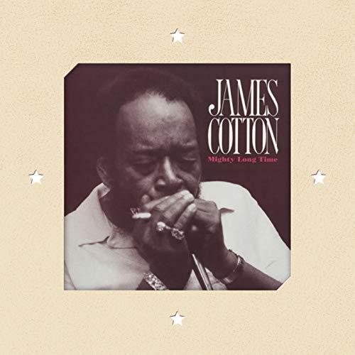 James Cotton album cover, portrait of a man playing a harmonica.