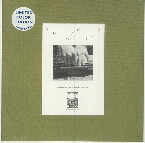 Yellow vinyl record cover with hands and abstract city image.